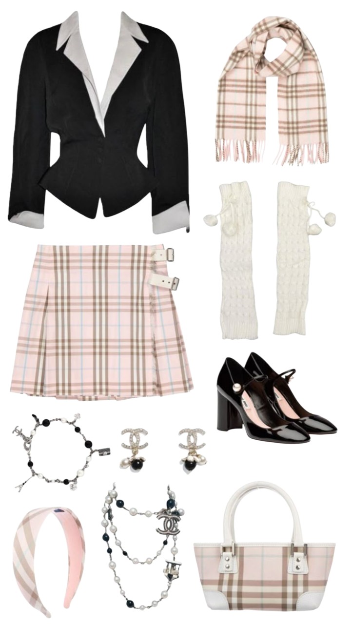 Preppy schoolgirl outfit consisting of white blouse, knit sweater, and plaid skirt